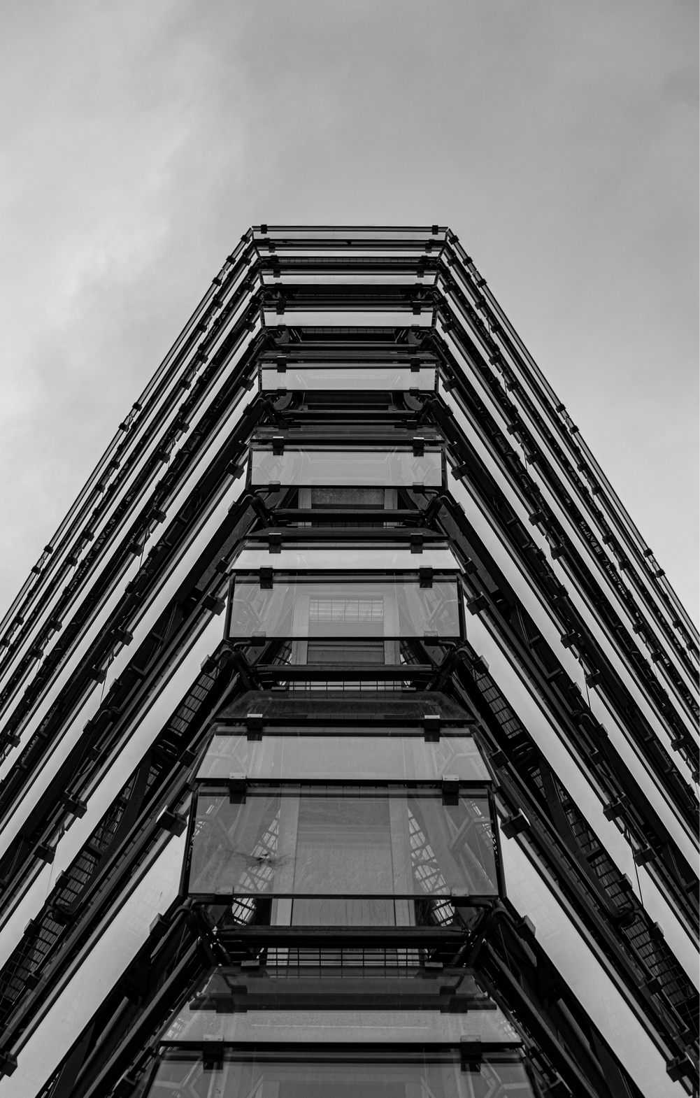 Gray scale Low Angle Photography of Concrete Building